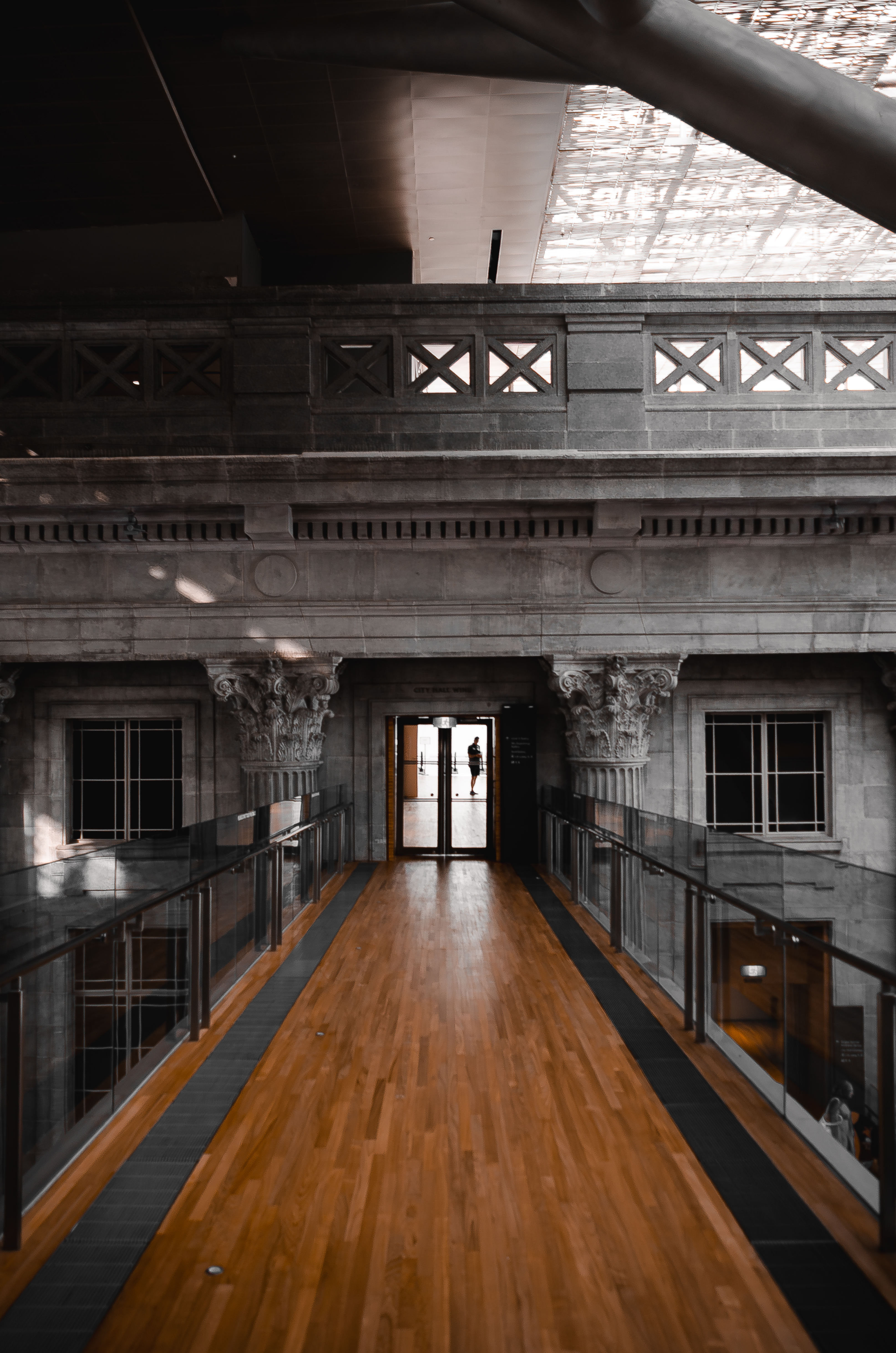 a person standing in front of a rock formation